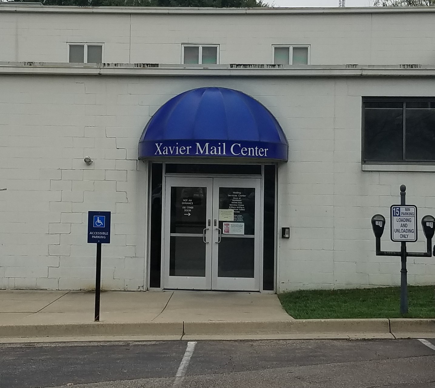 Exterior Photo of the Front Door to the XU Mailing Center