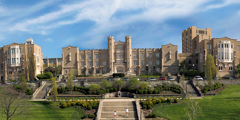 The exterior of Hinkle Hall, one of the most recognizable buildings on Xavier's campus, on a sunny day