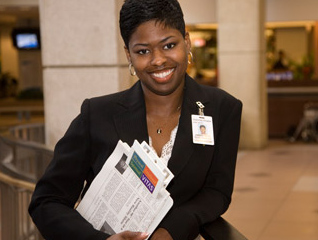 A professional with papers in her hand