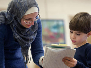 A teaching listening to a student