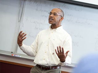 Med Special Education professor teaching in a classroom