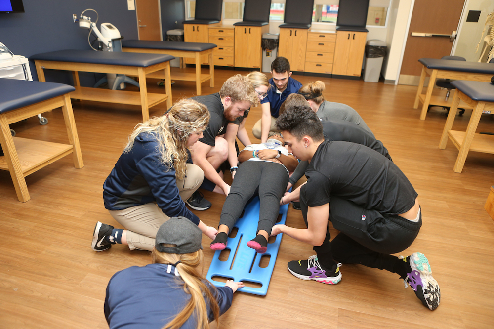 MSAT students learning emergency skills in the AT Classroom.