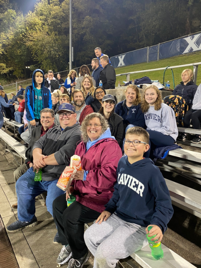 Photo of XU Students and Family at a Sporting Event