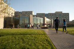 Students walking toward Justice Hall.