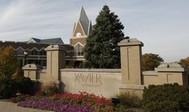 Xavier university sign with Gallagher Student Center behind