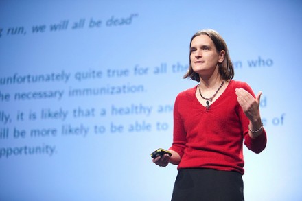 Photo of a Woman giving a presentation