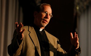 President Father Graham Speaking at Podium