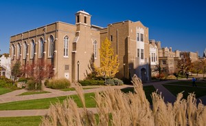 Exterior of Schmidt Hall during a fall day 