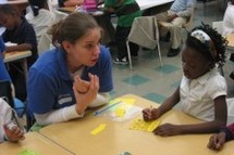 Photo of Student Teacher working with Child