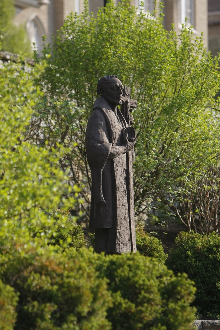 Saint Francis Xavier statue on Victory Parkway at a distance 