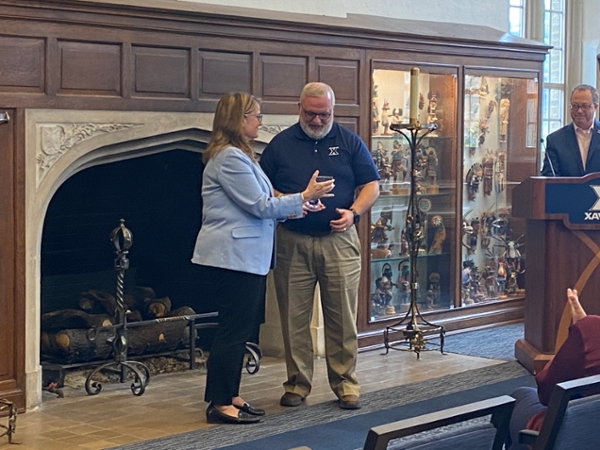 Photo of Douglas Riga receiving the award with President Hanycz