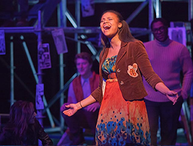 Student in Xavier's musical theatre major singing onstage