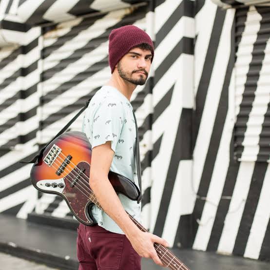 Photo of Tiberio with guitar