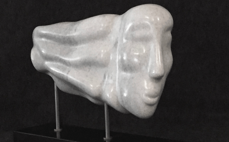 Carved stone work of a woman's face