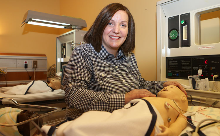 Terri Enslein in a nursing simulation lab