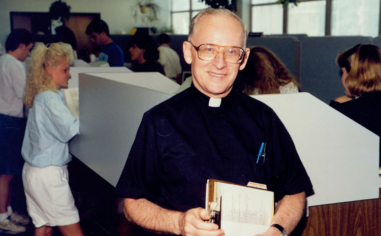 Fr. Kennealy in Dean's Office