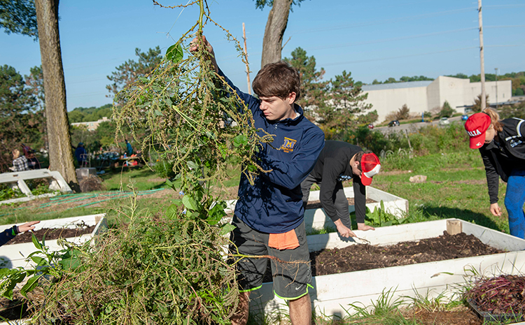 Xavier students participating in service project