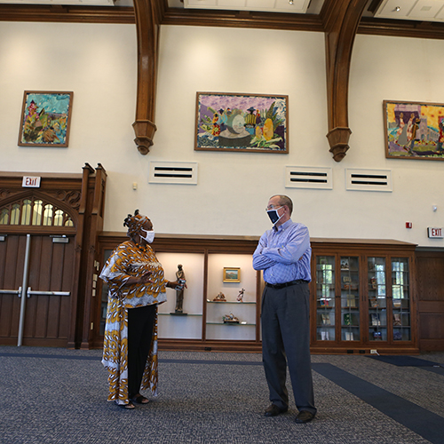 Photo of Fr. Graham talking with someone