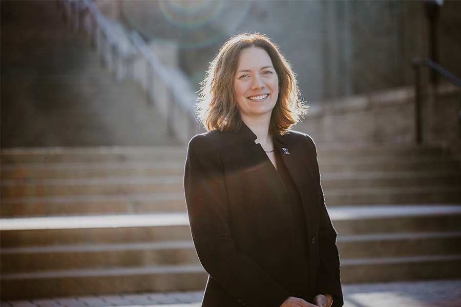 Portrait of Rachel Chrastil, PhD in front of the Ignatian Steps on Xavier's campus