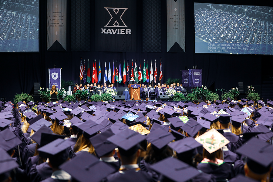 Xavier graduates sitting during their commencement ceremony. 