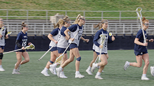 lacrosse-team-running.jpg