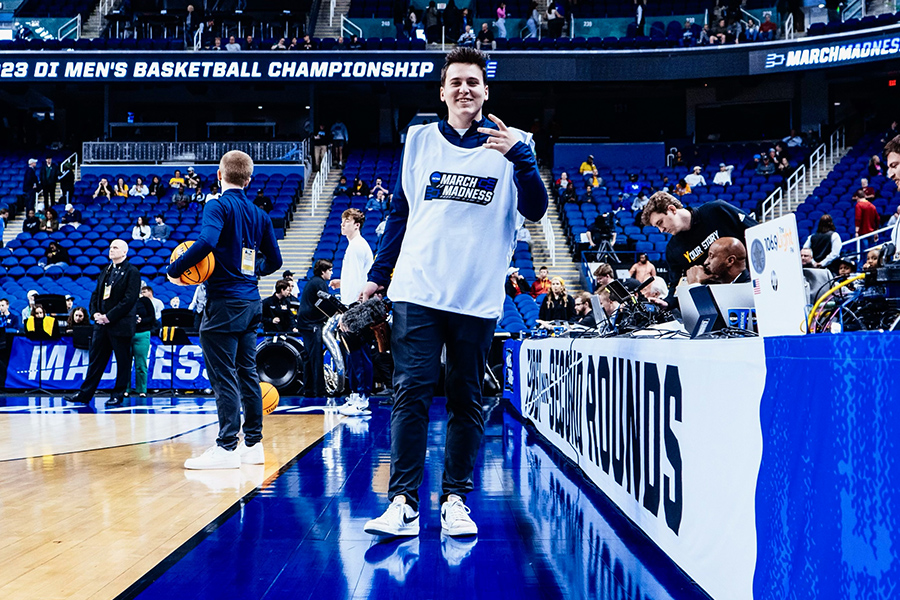 Xavier videographer Landen Brocato working the NCAA Tournament in Greensboro, North Carolina