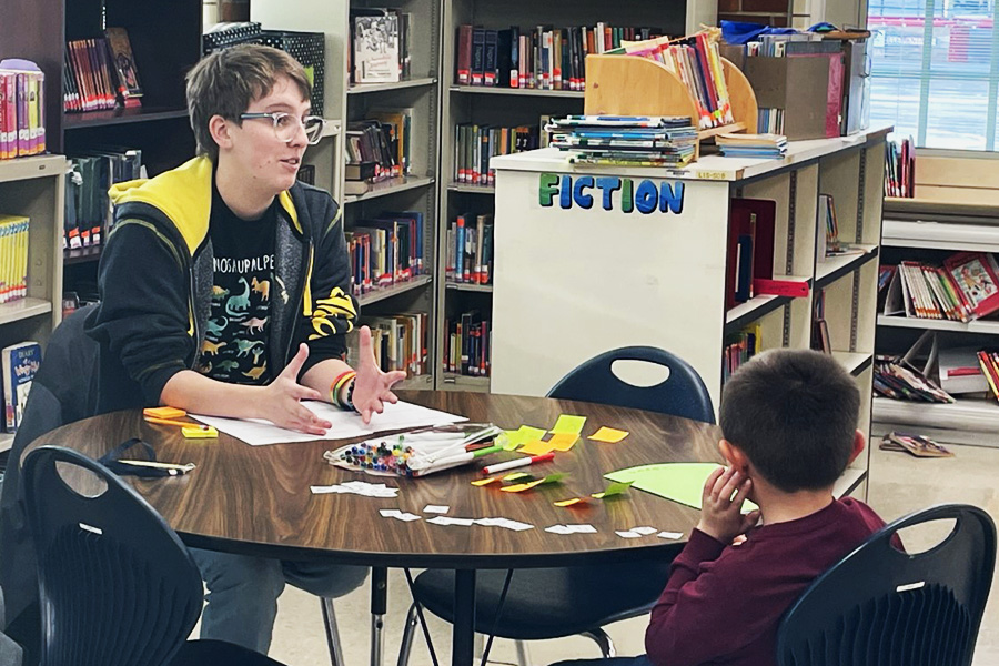 Xavier University education student Levi Davidson tutors a local elementary student