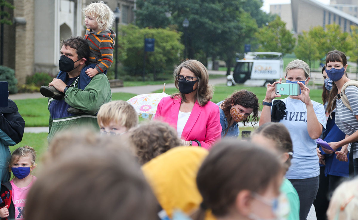 President Hanycz in the crowd with Xavier Montessori Lab School students and families.