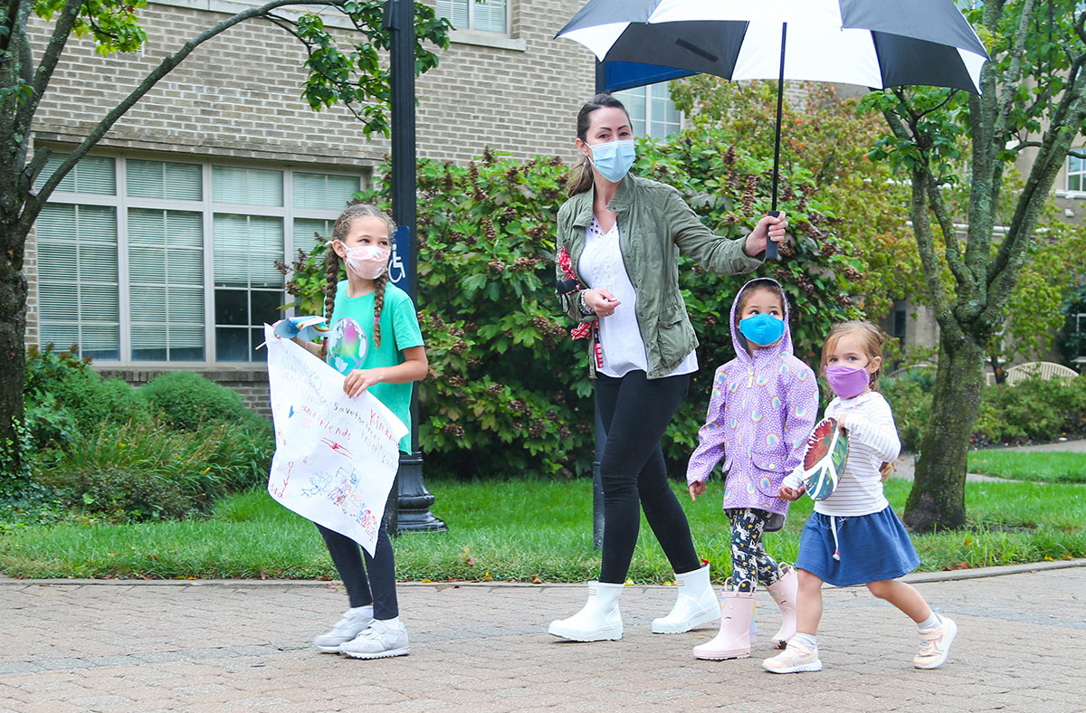 Montessori Lab School parent and young students.