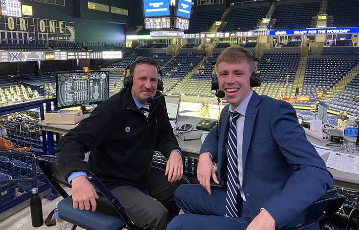 Photo of XU Commentators inside the Cintas Arena