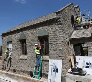 Photo of Construction Workers building a Chapel