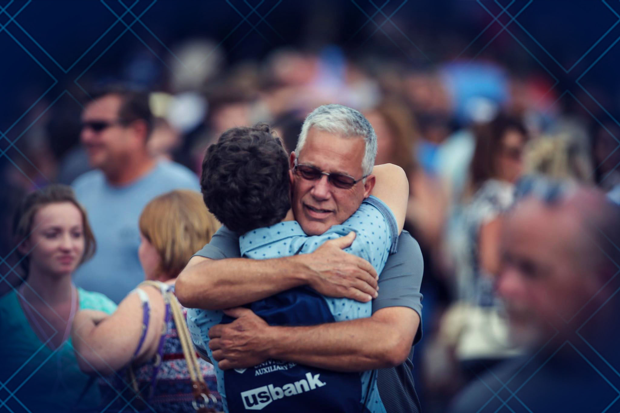 College Student hugging his Father photo