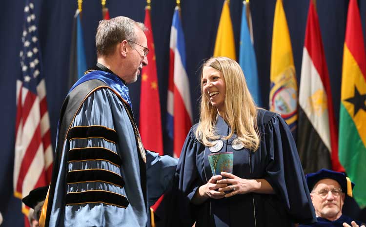 Xavier Alum Megan Zarnitz Accepting the Magis Award at the 2017 Commencement Ceremony