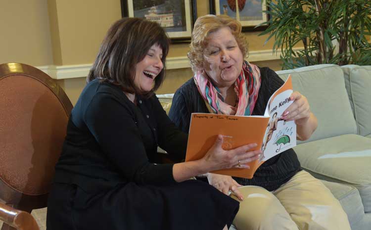 Kathleen Farfsing, left, and Maria, work on a color matching exercise.