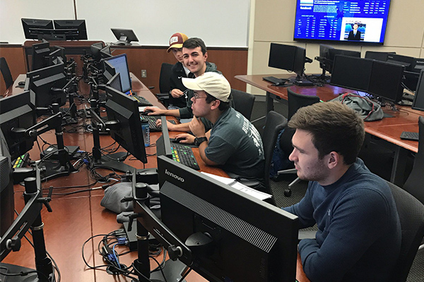 Williams College of Business students buying and trading stocks 