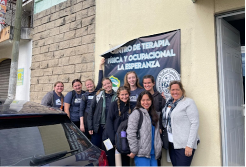 Xavier OTD students and faculty member, Marnie Renda, outside the clinic at La Esperanza.