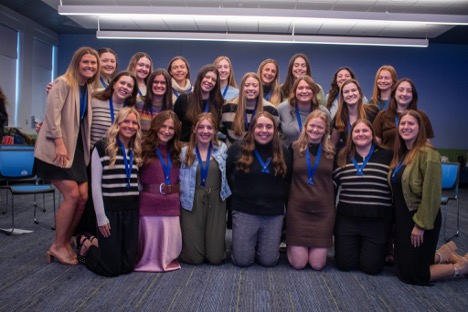 Students pose for photo after pinning ceremony