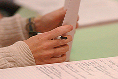 Photo of a Student going through papers
