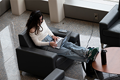 Photo of a Student doing work on their computer