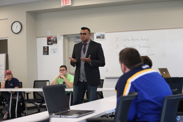 Photo of Professor Giving a Lecture to Students