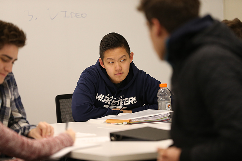 Photo of Students in a Classroom having a discussion