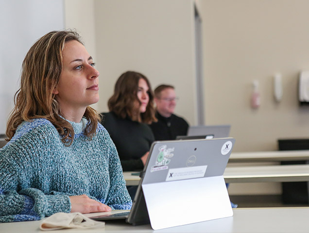 Politcal science major consulting with a professor at Xavier