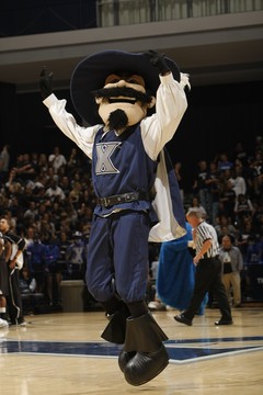 Musketeer Mascot jumping in the middle of the Cintas Arena