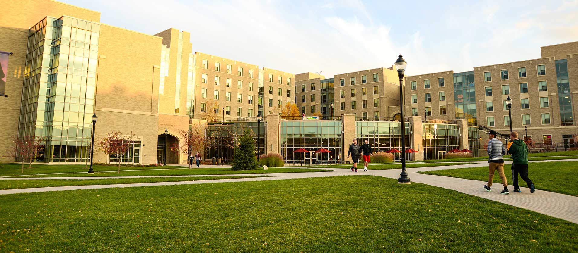 Exterior of Justice Hall and Hoff Dining Hall on a sunny summer day