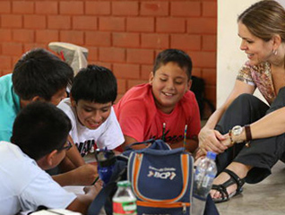 Student in the masters in school counseling program working with children