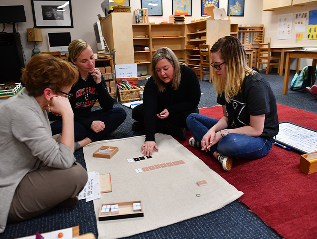 Students in the special education major learning about childhood development