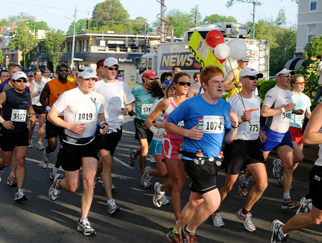 A group of runners participating in Cincinnati's annual Running Pig Marathon
