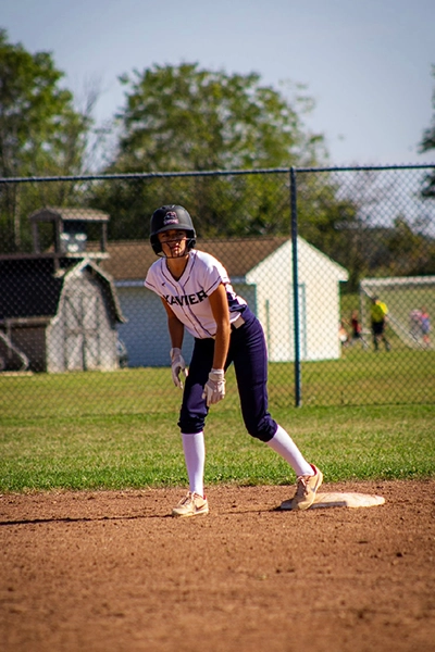 Nora playing softball