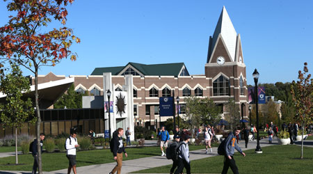 Students walking around the exterior of Gallagher Student Center