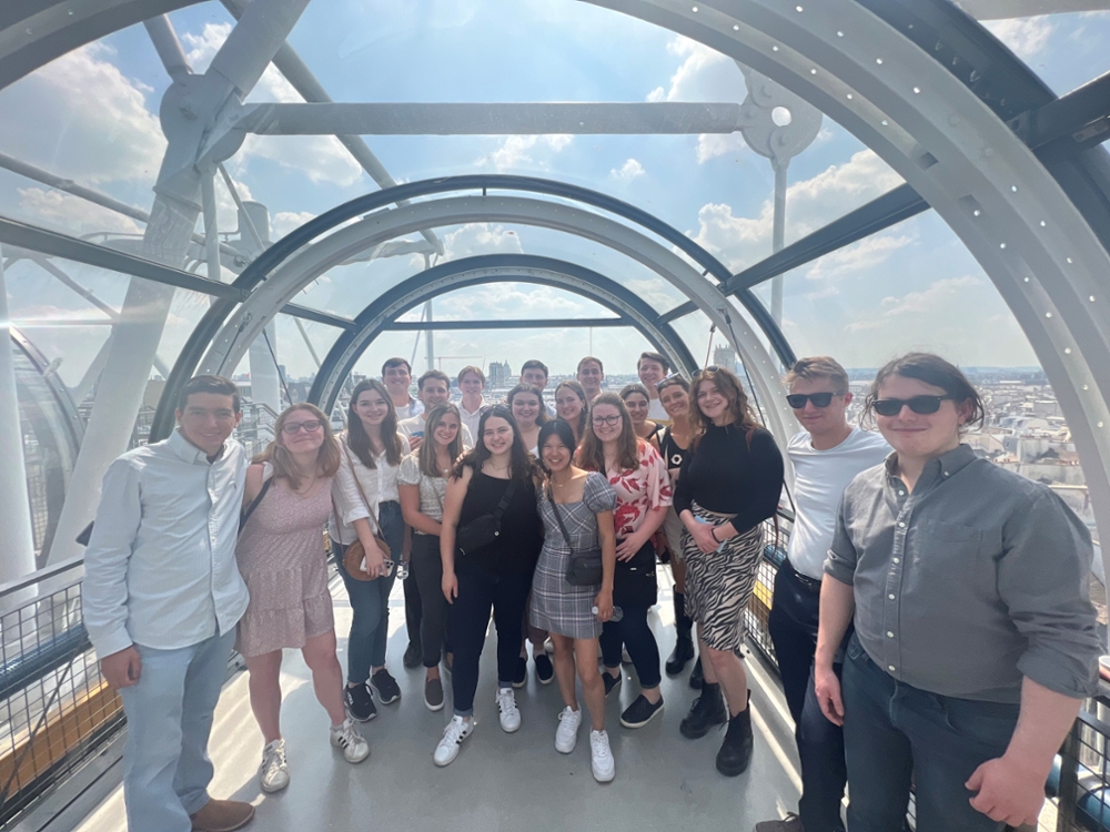 Students in a glass funicular in Brussels